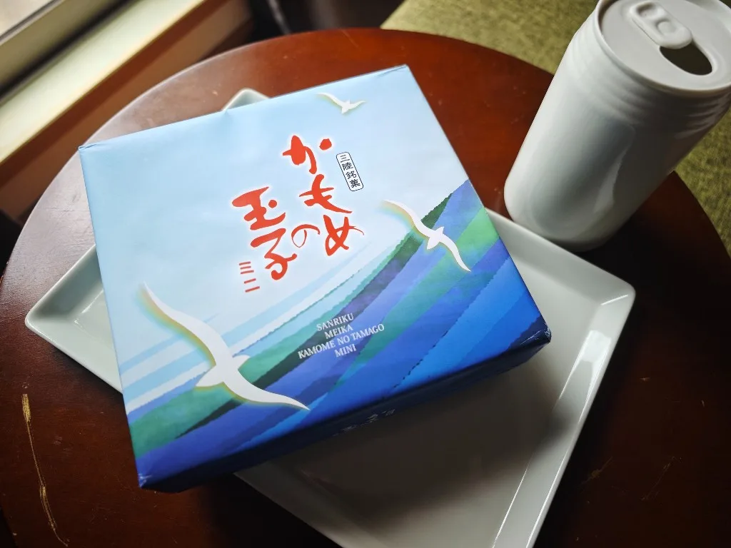 Kamome no Tamago Mini gift box photographed from above on a white plate