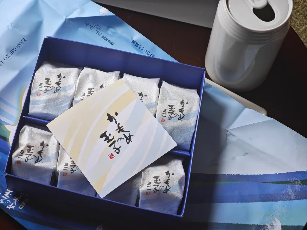 Open Kamome no Tamago Mini box with pamphlet and eight wrapped pieces