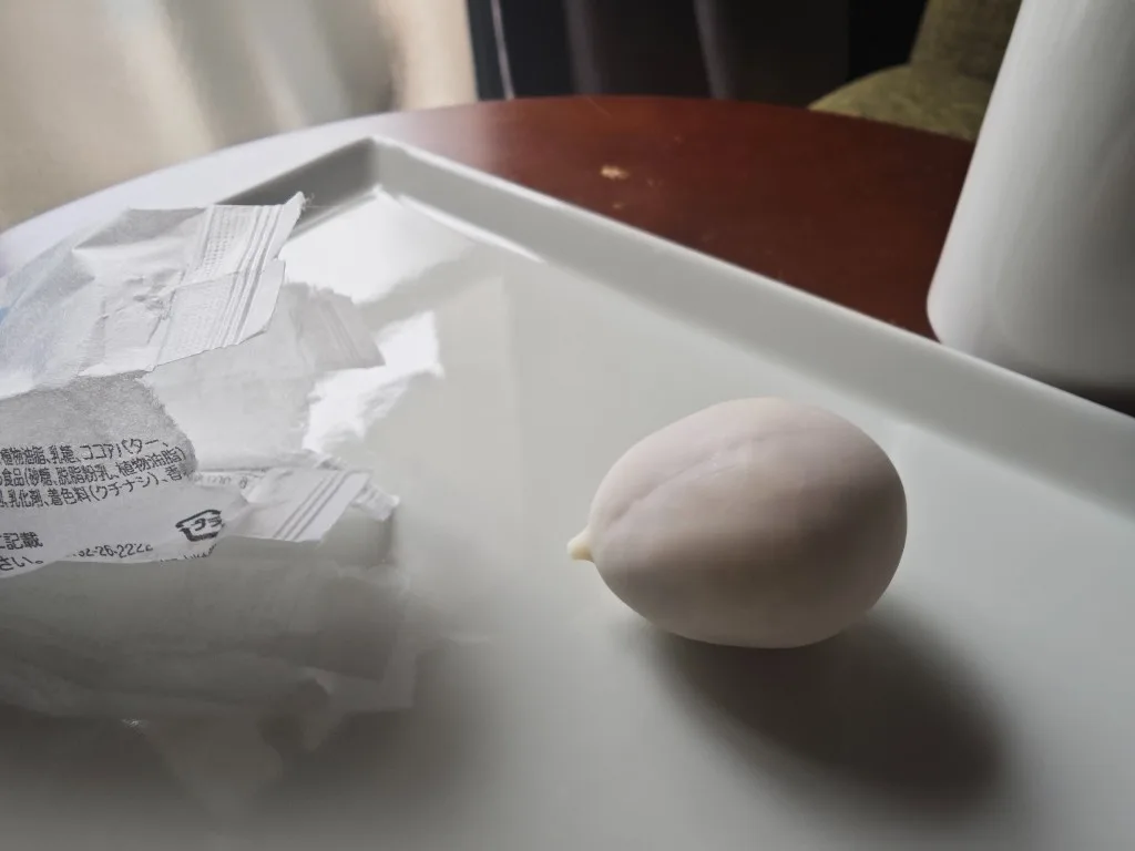 Unwrapped Kamome no Tamago Mini on a white plate