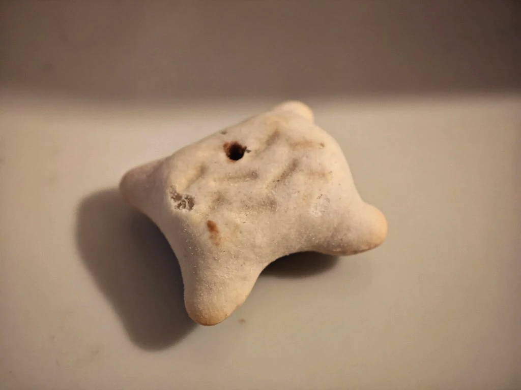 Small chocolate injection hole on the back of a Koala's March biscuit