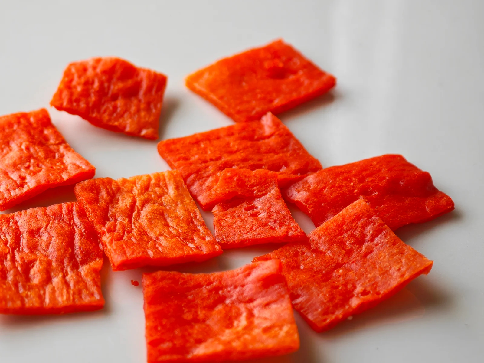 Close-up of fish-surimi sheets from classic red Cut Yocchan
