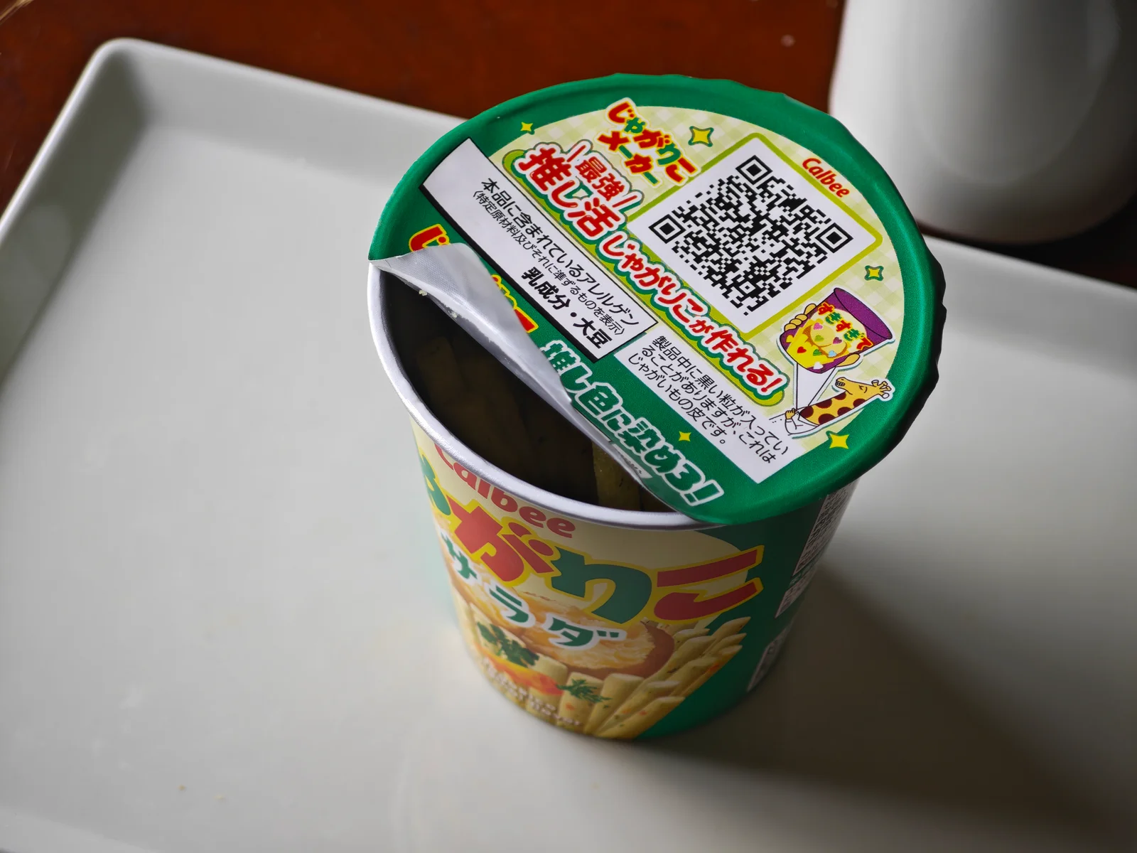 Jagarico lid peeled only partway, leaving foil to close later