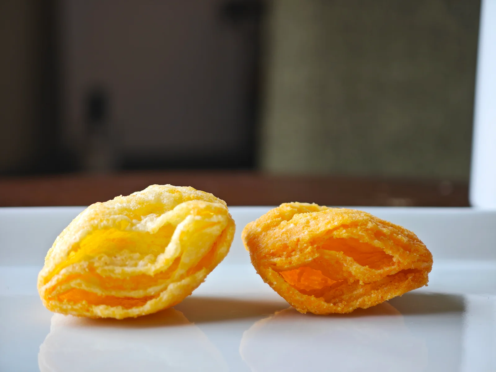 Close comparison of Seven Rich Cheese on the left and YBC Rich Cheddar on the right