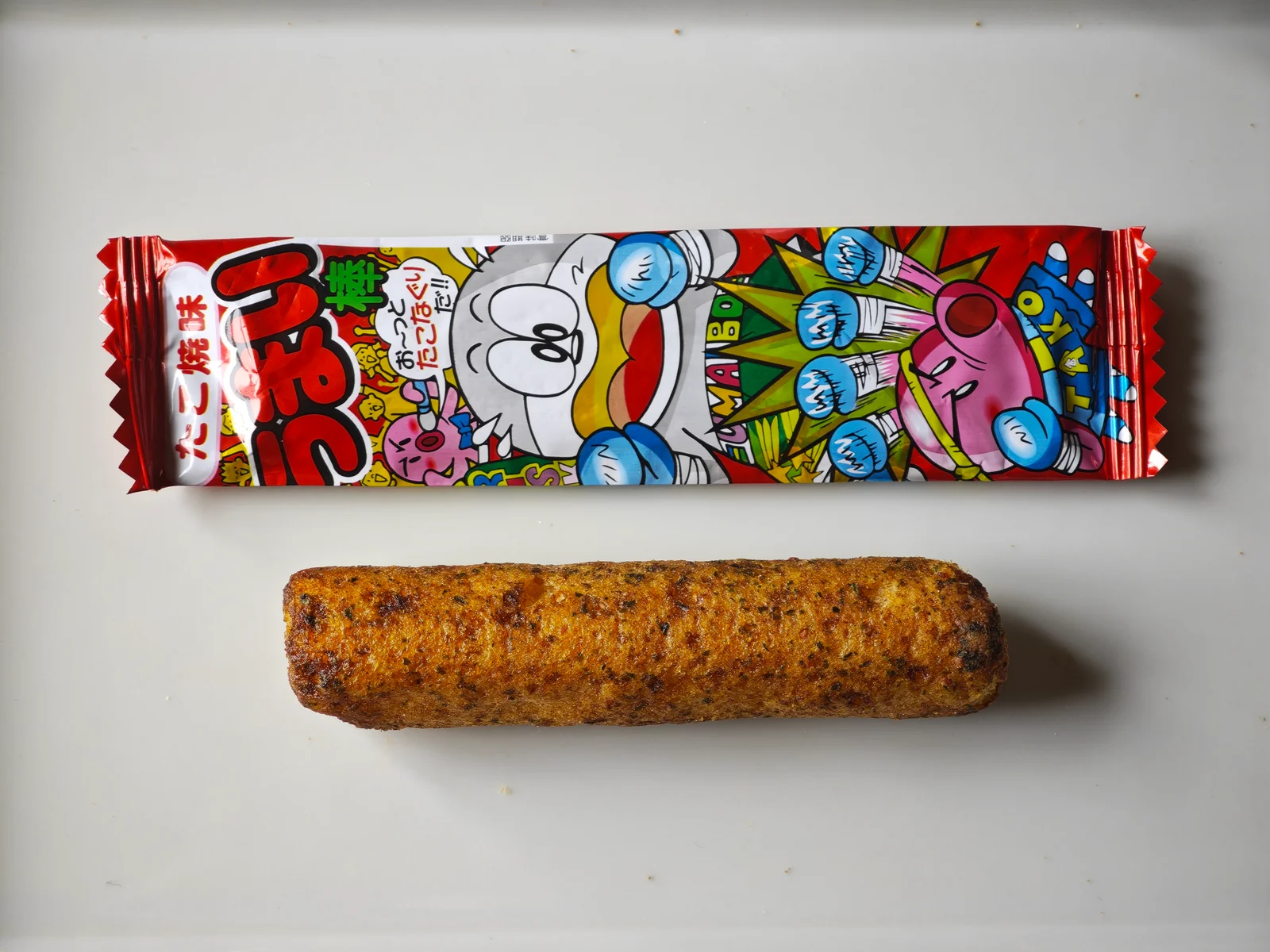 Takoyaki Umaibo wrapper and unwrapped corn stick