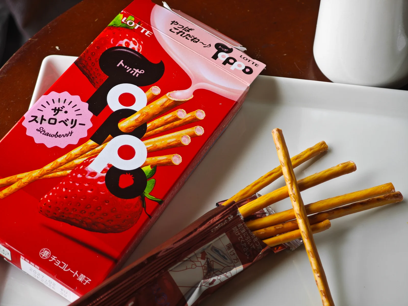 Strawberry Toppo sticks photographed from above
