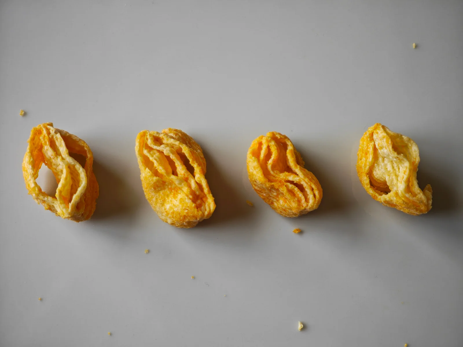 Four Aerial pieces arranged to show differences in opening, width, and compression