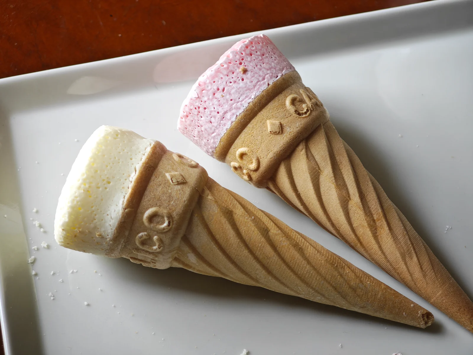 Strawberry and milk Caplico side by side