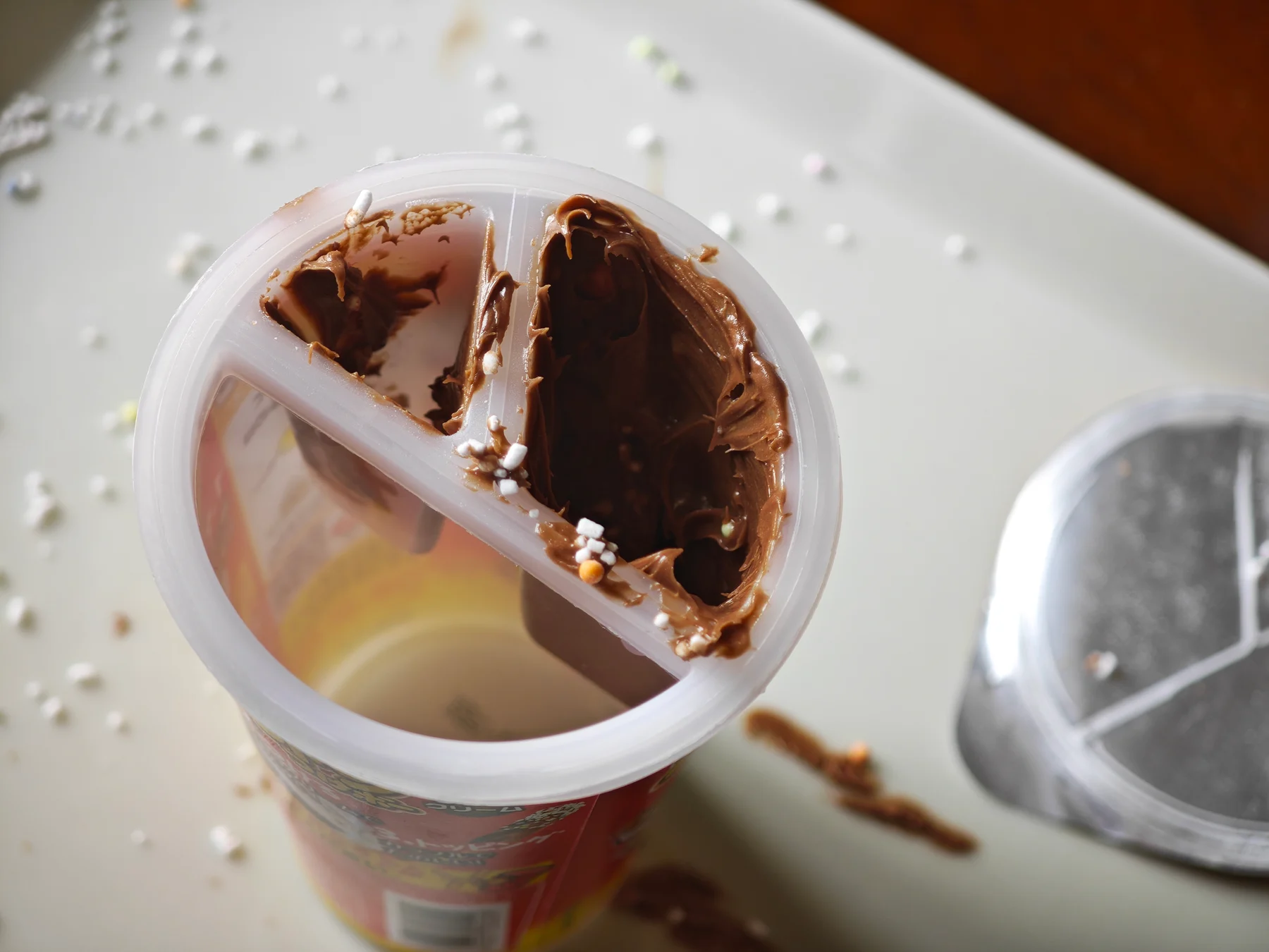 Opened Yan Yan cup after a cracker has broken in the remaining cream