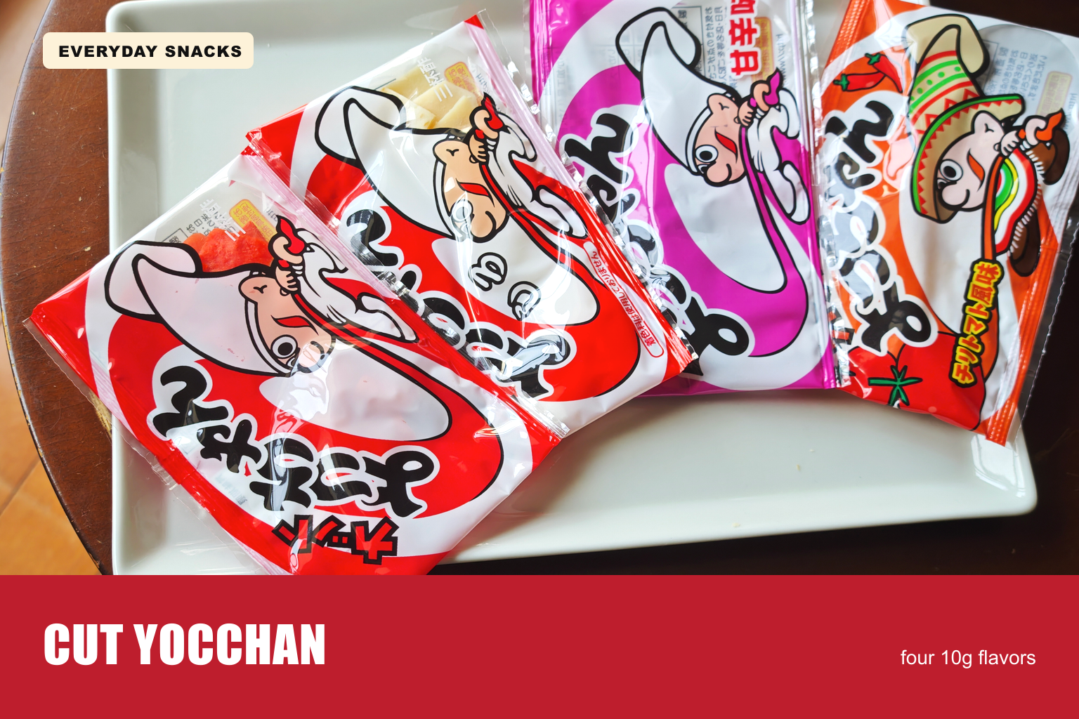 Four Cut Yocchan 10g flavor packs arranged on a white plate