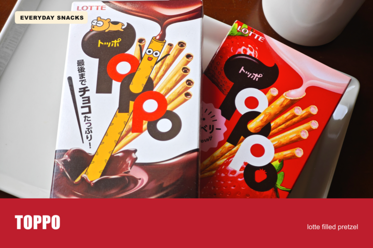 Classic and strawberry Lotte Toppo boxes on a white plate